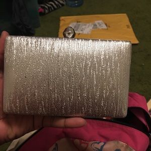A small sliver hand bag